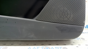 Panou ușă stânga față Tesla Model X 22-25, negru, cu inserție din piele albă, zgârieturi pe plastic, rupturi în piele, elemente de fixare rupte, necesită curățare chimică