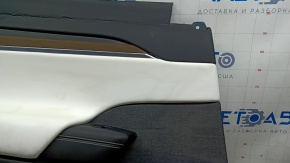 Обшивка двери карточка задняя левая Tesla Model X 22-26 черная, с белой вставкой кожа, вставка под дерево, вставка ткань, динамик, управление стеклоподъемником, стрельнутая подушка, под химчистку, ты