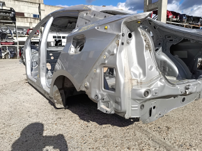 Aripă spate stânga Toyota Prius 50 19-22 sub BSM pe caroserie, argintiu, cu proeminențe
