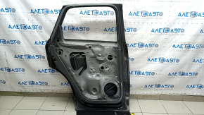 Дверь голая задняя левая Audi Q3 83A 19-25 графит LX7G, вмятина