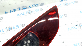 Фонарь внутренний крышка багажника левый Mazda 3 19-22 4d тип 1, царапины