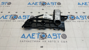 Крепление переднего бампера левое Toyota Prius V 12-17