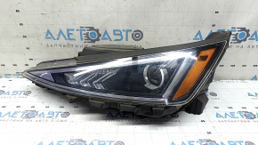 Far stânga față Hyundai Elantra AD 19-20 halogen cu suporturi și capac, nisip