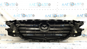 Решетка радиатора grill Mazda CX-9 16-19 без эмблемы, с подиумом, треснута, после ремонта, сломаны крепления