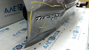 Дверь багажника в сборе Hyundai Tucson 22-26 Korea, тонировка, серебро R2T, Hybrid, вмятина, царапины на накладке, царапины на обшивке