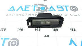 Подсветка номера заднего бампера левая Kia K5 21-26