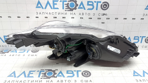 Фара передняя левая Toyota Prius V 12-14 дорест галоген