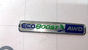 Emblema ECOBOOST AWD de pe hayonul modelului Ford Edge 19-24 s-a desprins.