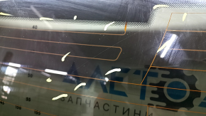 Luneta unui Audi A6 C7 12-18 are un fir de încălzire rupt și nu este fumurie din fabrică.