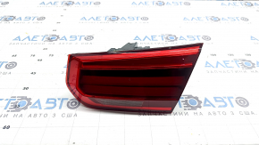 Фонарь внутренний крышка багажника правый BMW 3 F30 16-18 светлый, царапины