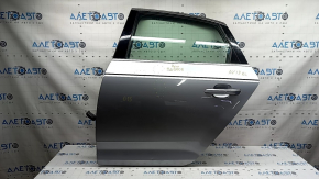 Дверь в сборе задняя левая Audi A4 B9 17-19 серебро LZ7G, keyless, крашена 0,15, тычки, вмятина