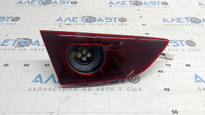 Фонарь внутренний крышка багажника левый Mazda 3 19-22 4d тип 1 под полировку