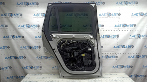 Ansamblu ușă spate stânga fără cheie Volvo XC90 16-26, fumuriu, argintiu 711, cu bara de protecție