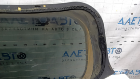 Luneta portbagajului modelului Kia Sportage 23-26 este acoperită de funingine.