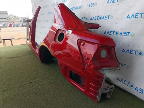 Задняя левая четверть кузова Toyota Camry, на фото деталь с вмятиной и следами ремонта.
