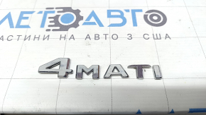 Sigla 4MATIC de pe capota portbagajului modelului Mercedes W213 E 17-23 lipsește litera C.