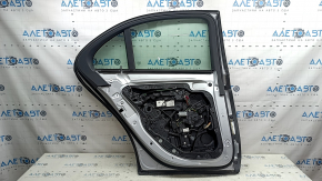 Ansamblu ușă spate stânga fără cheie Mercedes W213 E 17-23, argintiu 775, zgâriat