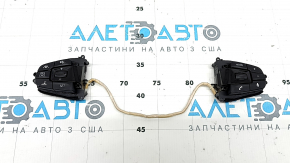 Butoanele de comandă de pe volanul BMW 5 G30 17-22 sunt negre, Sport, pentru radar distronic și menținerea benzii de rulare și sunt uzate