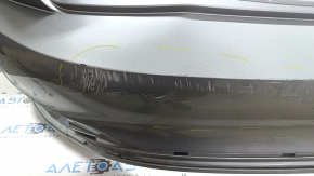Бампер задний голый VW Jetta 22-26 серебро, царапины, надрывы, трещины, отсутствует фрагмент