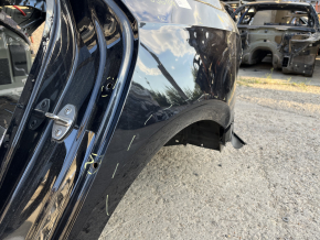 Aripă spate stânga VW Passat b8 16-19 USA pe caroserie, neagră, îndoită, găuri care nu provin din fabrică, crăpături