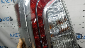 Far stânga Toyota Prius 30 12-15 repaus, umezeală și crăpături sub geam