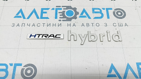 Emblemă inscripționată HTRAC HYBRID pe portbagaj Hyundai Tucson 25-26