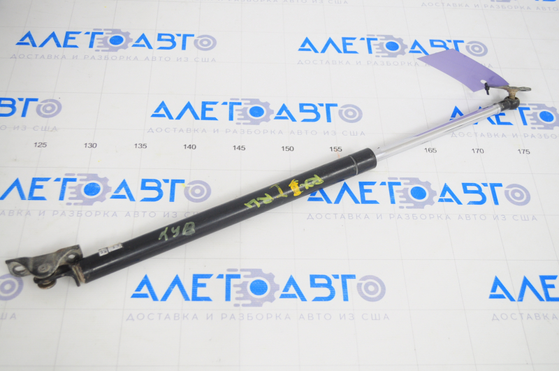 Амортизатор двери багажника левый Lexus RX300 98-03 KYB