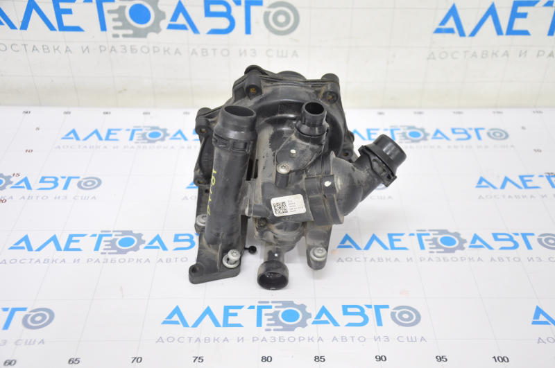 Помпа охлаждения с корпусом термостата в сборе VW Passat b7 14-15 USA 1.8Т