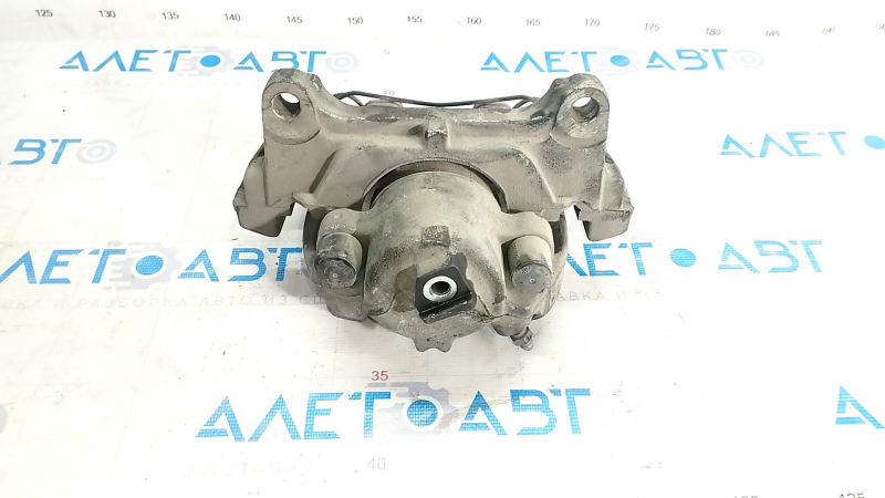 Суппорт передний левый VW Passat b7 12-15 USA