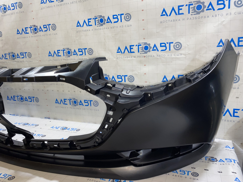 Бампер передний голый Mazda 3 19-26 4d