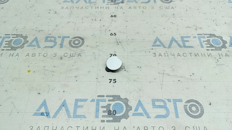 Заглушка заднего бампера левая малая Mazda 3 19-26 4d
