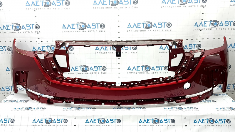Бампер передний голый Mazda CX-50 23-26 красный, прижат, царапины, сломаны крепления