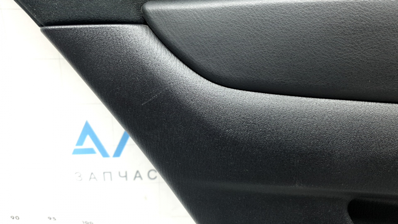 Обшивка двери карточка задняя левая Mazda CX-9 16-23 черная с черной вставкой велюр, подлокотник черная кожа, серый молдинг, потёртость, царапины