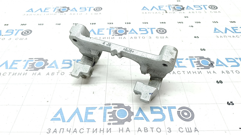 Скоба суппорта заднего левая Subaru Forester 25-26
