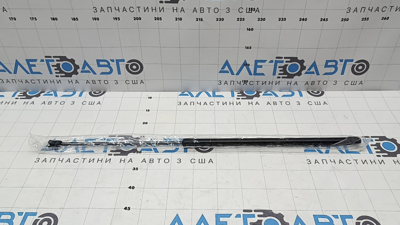 Амортизатор капота левый VW CC 13-17 рест