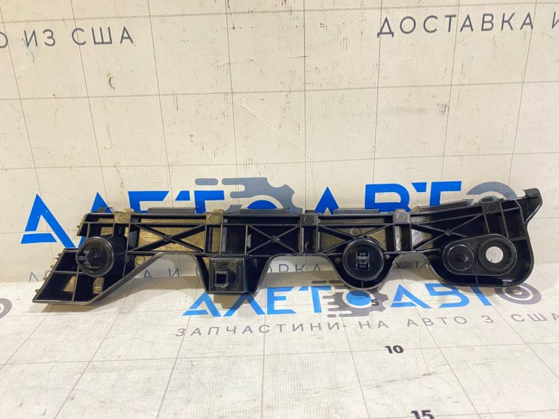 Suportul pentru bara spate stânga Mazda 3 14-18 BM nou aftermarket
