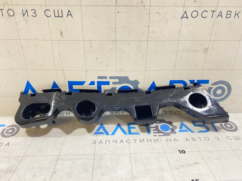 Suportul pentru bara spate stânga Mazda 3 14-18 BM nou aftermarket