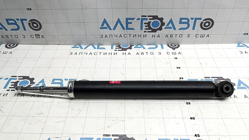 Амортизатор задний левый Nissan Leaf 18-25 под 40 kWh с опорой