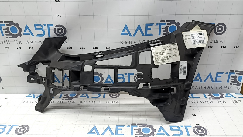 Кронштейн переднего бампера левый Mercedes C-class W205 15-18 под фарой