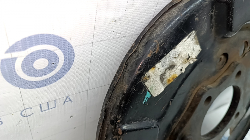Кожух тормозного диска задний левый Toyota Camry v55 15-17 usa примят
