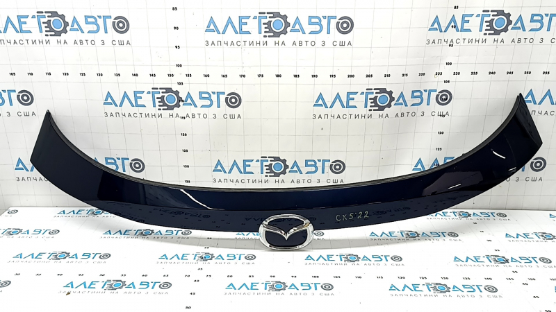 Молдинг двери багажника верхний Mazda CX-5 17-24 с эмблемой, под стеклом, надломано крепление