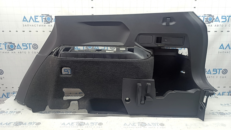 Обшивка арки левая VW Tiguan 18-19 черная под 3 ряда, без подстаканника, царапины