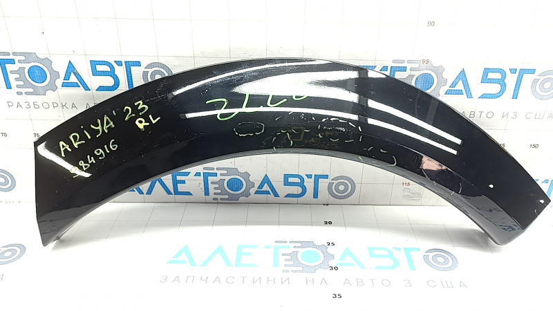 Ornament arc aripă spate stânga Nissan Ariya 23-26 negru lucios, zgârieturi
