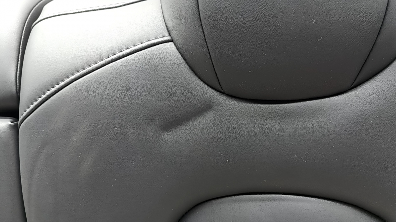 Спинка заднего ряда сидений левая Tesla Model 3 18-23 кожа черная, с ремнем и подогревом, примята