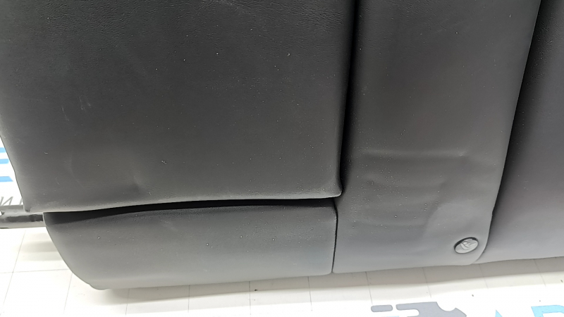 Спинка заднего ряда сидений левая Tesla Model 3 18-23 кожа черная, с ремнем и подогревом, примята
