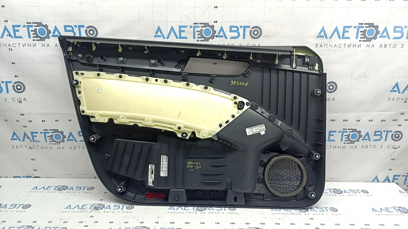 Обшивка двери карточка передняя правая VW Passat b8 16-19 USA черная, с темно-серой накладкой под дерево, вставка кожа черная, подлокотник кожа черная