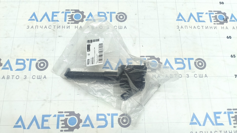 Форсунка омывателя фары левая Mitsubishi Outlander 22-26
