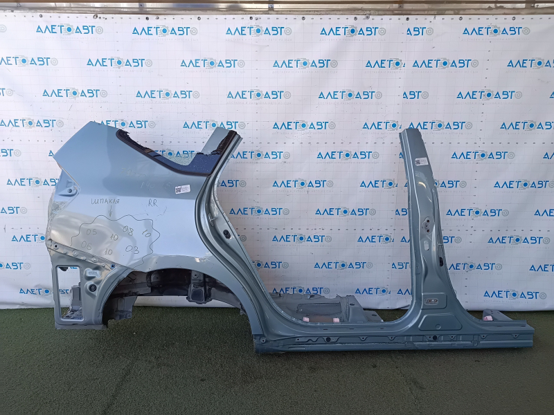 Четверть крыло задняя правая Toyota Prius V 12-17 отпилена с центральной стойкой, зеленая, после ремонта, тычки