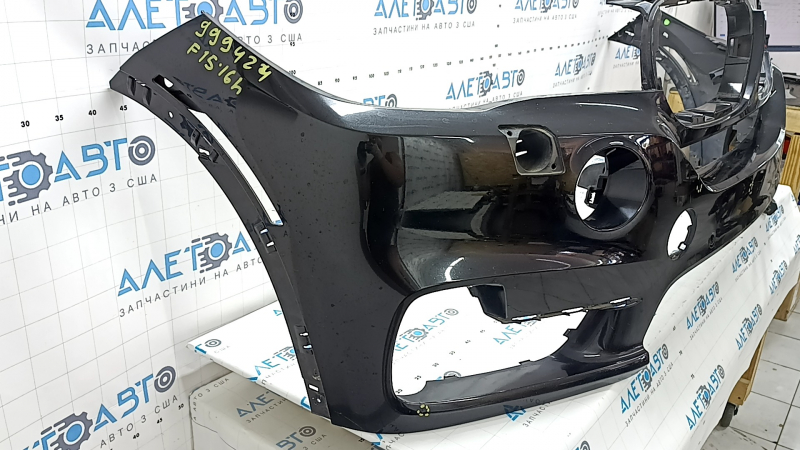 Бампер передний голый BMW X5 F15 14-18 под 2 парктроника, омыватели фар, черный, тычки, вмятины, нештатные отверстия