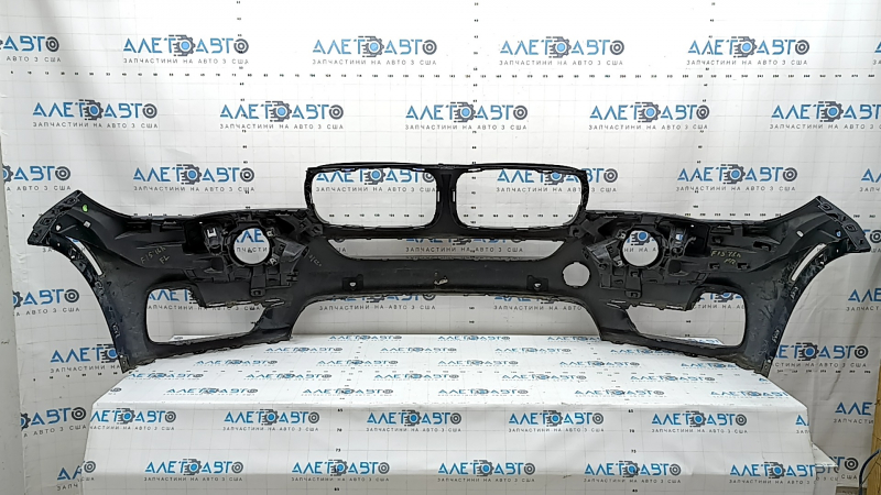 Бампер передний голый BMW X5 F15 14-18 под 2 парктроника, омыватели фар, черный, тычки, вмятины, нештатные отверстия